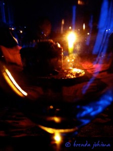 iPhone Photograph of wine glass and chocolate cake by brenda johima